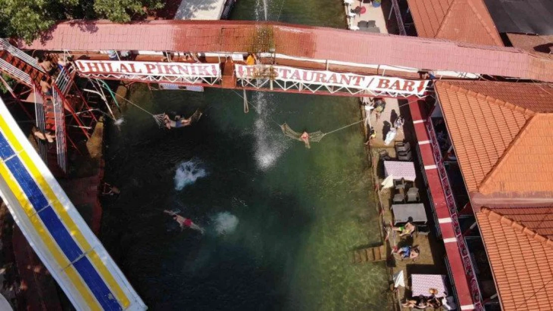 Alanya'nın bunaltıcı sıcağından kaçanların ilk durağı buz gibi suyuyla Dim Çayı oldu