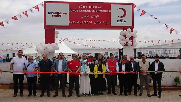 İdlib'te 901 aile briket eve kavuştu